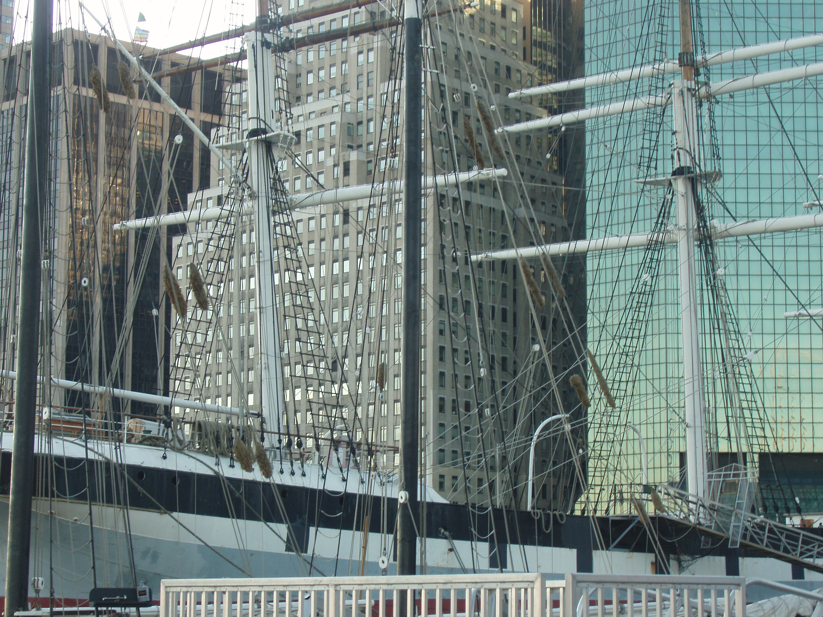 tall ships with Manhattan as a background