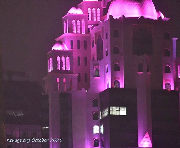 A building with purple lights
AI-generated content may be incorrect.